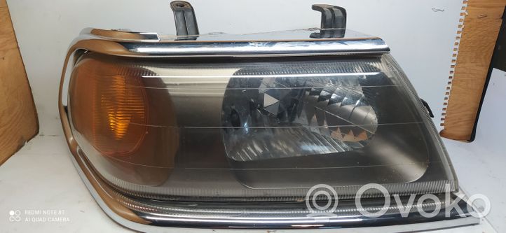 Mitsubishi Pajero Sport I Headlight/headlamp 10087415