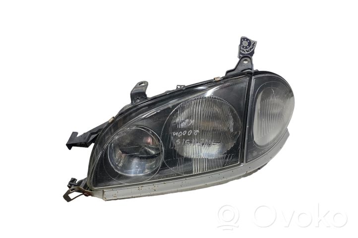 Toyota Avensis T220 Lampa przednia 8115005140