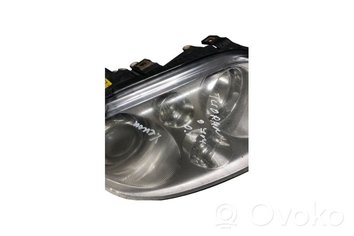 Volkswagen Touran I Lampa przednia 1T0941032K