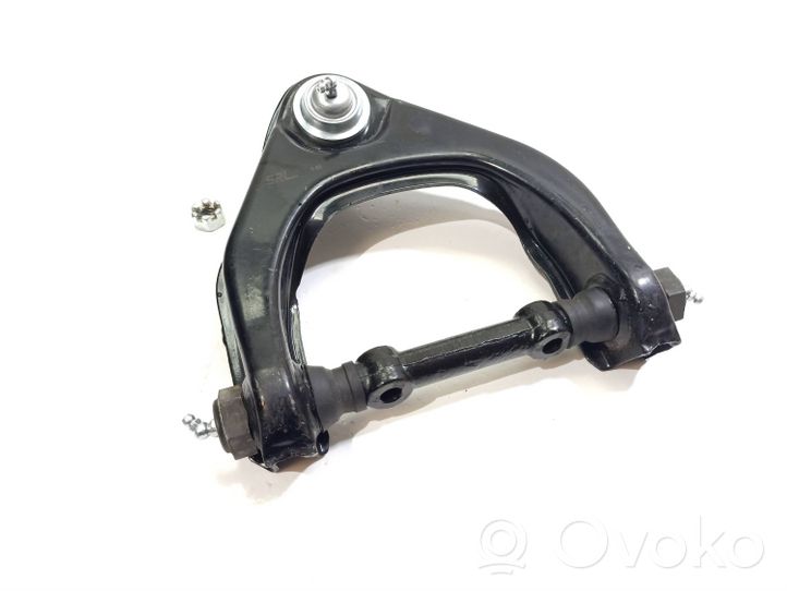 Mitsubishi L200 Brazo de suspensión/horquilla superior delantera 527637-2