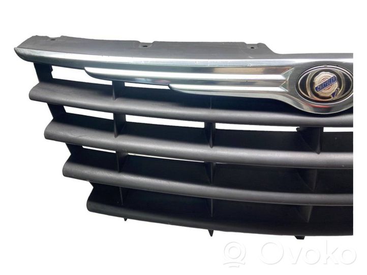 Chrysler Voyager Front bumper upper radiator grill 04857960AA