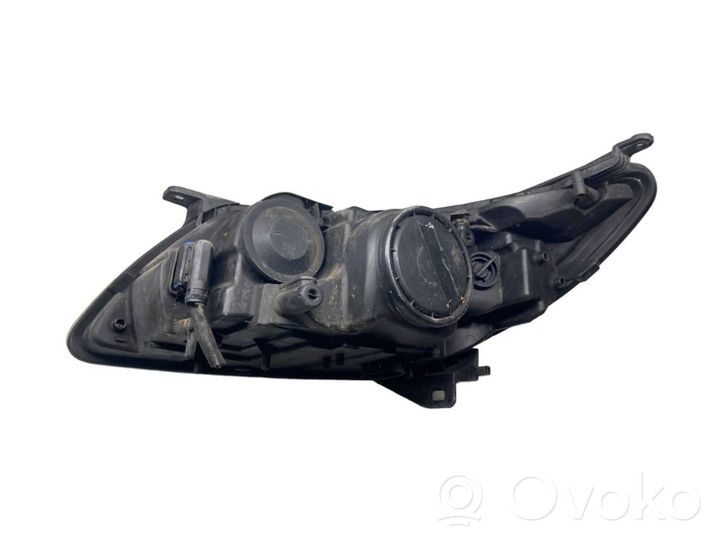 Saab 9-3 Ver2 Lampa przednia 1EL00960602