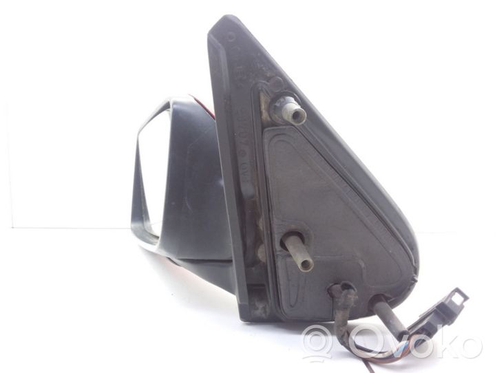 Volkswagen Golf III Front door electric wing mirror E10217384