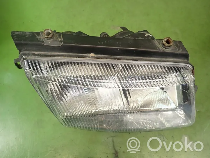 Volkswagen PASSAT B5 Lampa przednia 06-441-1125R