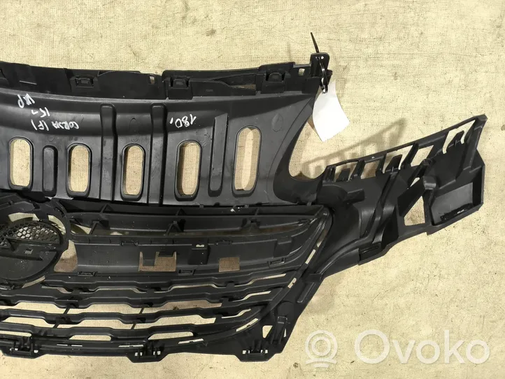 Opel Corsa E Maskownica / Grill / Atrapa górna chłodnicy 39003576