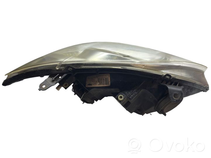 Toyota Corolla E120 E130 Lampa przednia 8115002380