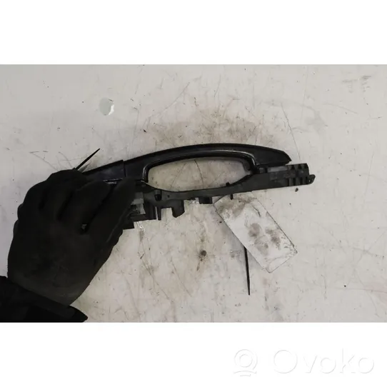 Opel Astra J Front door exterior handle 