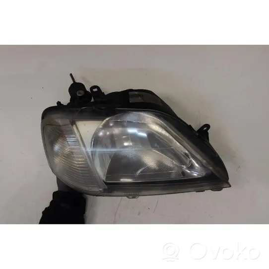 Dacia Logan I Lampa przednia 89029770