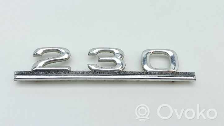 Mercedes-Benz E W123 Emblemat / Znaczek tylny / Litery modelu 1238170415