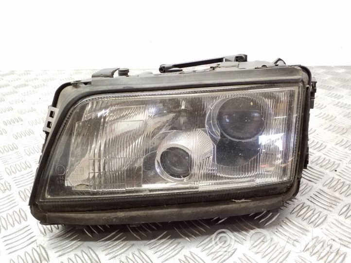 Audi A8 S8 D2 4D Lampa przednia 1305219058