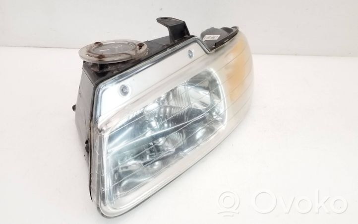 Chrysler Town & Country III Lampa przednia 4600159445