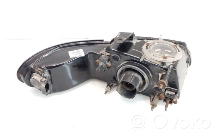 Chrysler Town & Country III Lampa przednia 4600159445