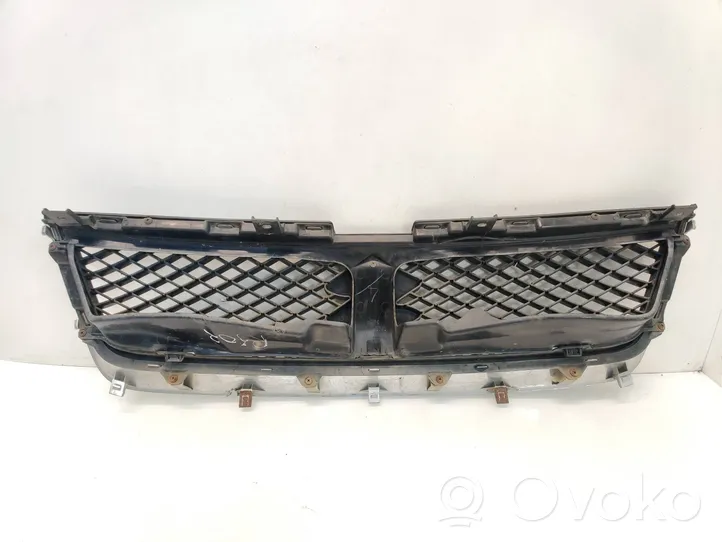 Suzuki Grand Vitara II Maskownica / Grill / Atrapa górna chłodnicy 7174365J0