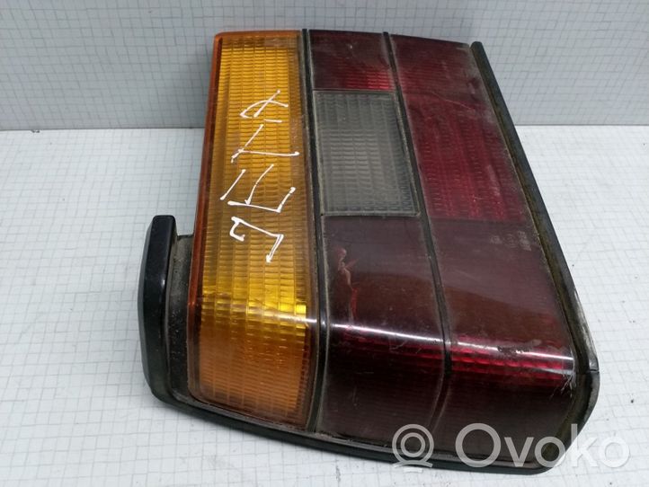 Volkswagen Jetta II Aizmugurējais lukturis virsbūvē 165945111B