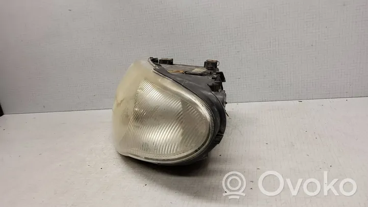 Chrysler Voyager Lampa przednia 04857831AC