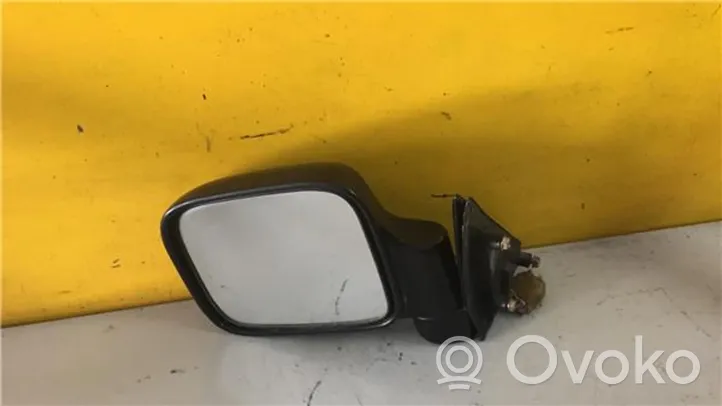 Opel Monterey Specchietto retrovisore elettrico portiera anteriore E13010624