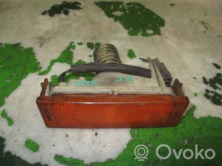 Renault Express Lampa przednia 7700811996