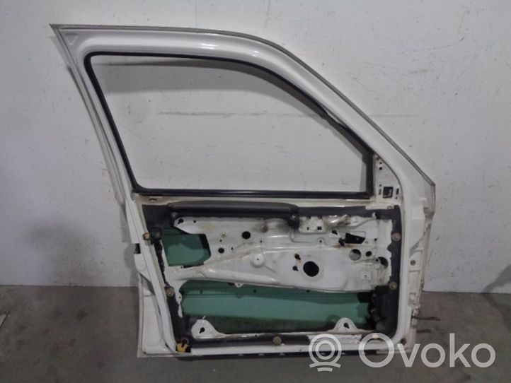 Volkswagen Golf III Porte avant 1H4831055