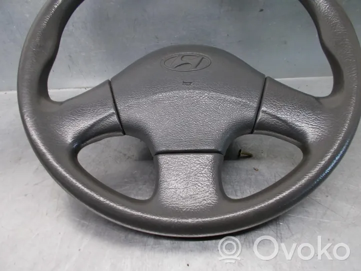 Hyundai Scoupe Volant 5611023502AQ