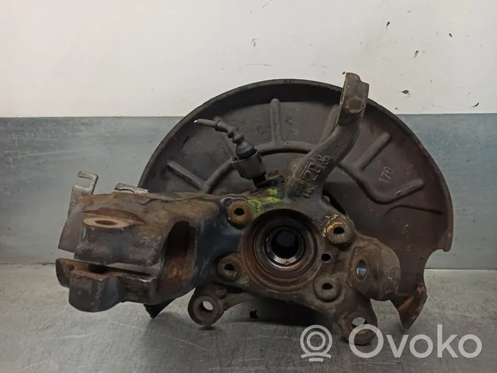 Opel Corsa B Zwrotnica koła przedniego 1K0407256AA