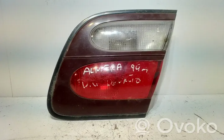 Nissan Almera Задний фонарь в крышке 