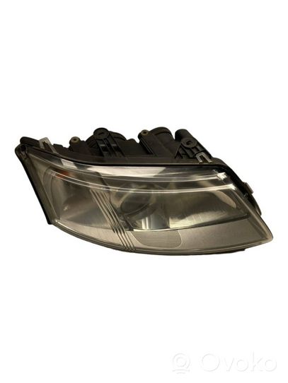 Saab 9-3 Ver2 Lampa przednia 15582600RE