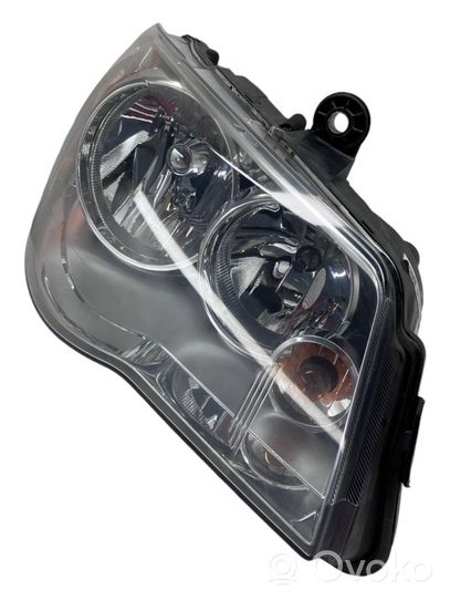 Chrysler Voyager Lampa przednia 05113340AE