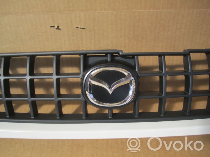 Mazda Demio Grille calandre supérieure de pare-chocs avant 
