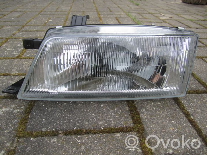 Suzuki Baleno EG Lampa przednia 