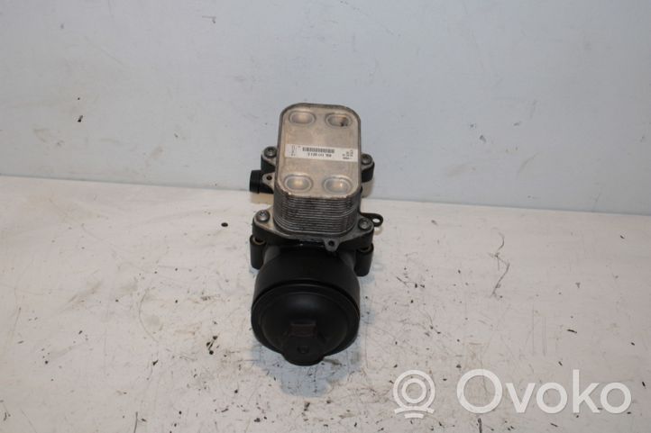 Volkswagen Touran II Oil filter mounting bracket 03L117021C