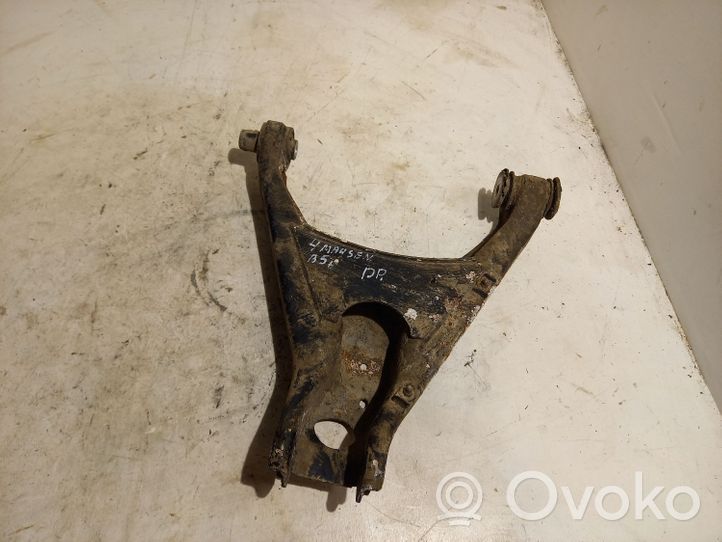 Volkswagen PASSAT B5.5 Braccio di controllo sospensione posteriore superiore/braccio oscillante 4B0505311