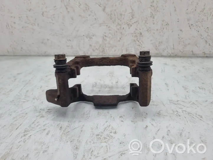 Volkswagen Touran I Brake caliper pad carrier rear 