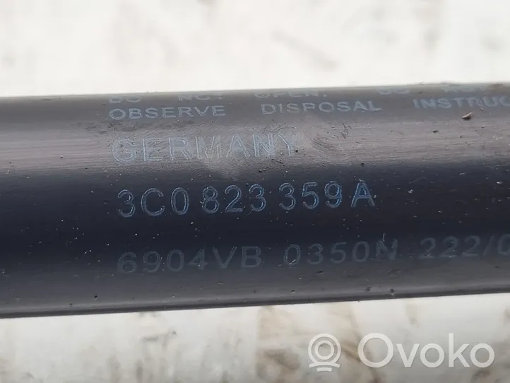 Volkswagen PASSAT B6 Siłownik maski przedniej 3C0823359A