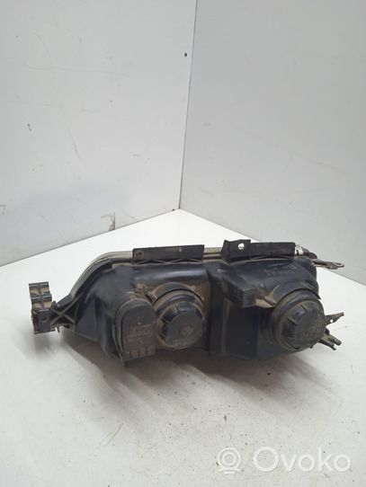 Peugeot 605 Lampa przednia 09991609