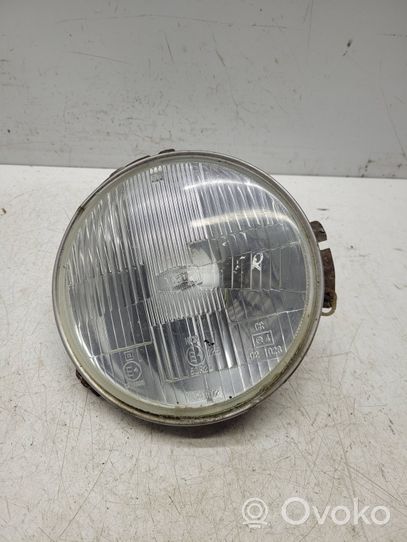 Isuzu Trooper Lampa przednia 150R20