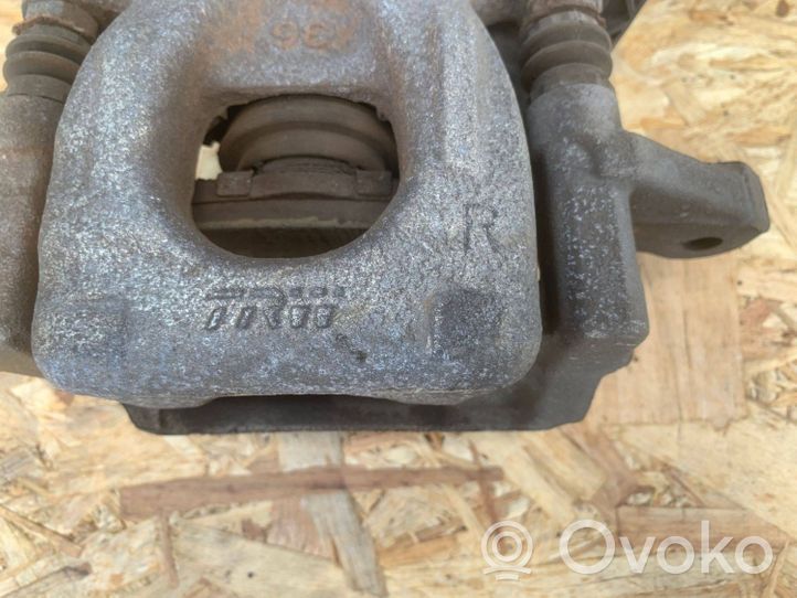 Nissan Qashqai Caliper del freno trasero 440014EA0A