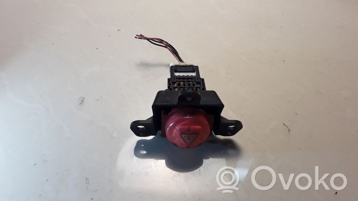 Nissan Almera Tino Botón interruptor de luz de peligro 06016