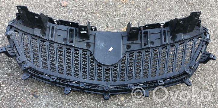 Buick Encore II Front bumper upper radiator grill 42582101