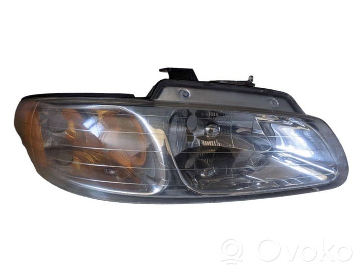 Chrysler Voyager Lampa przednia 083331110R