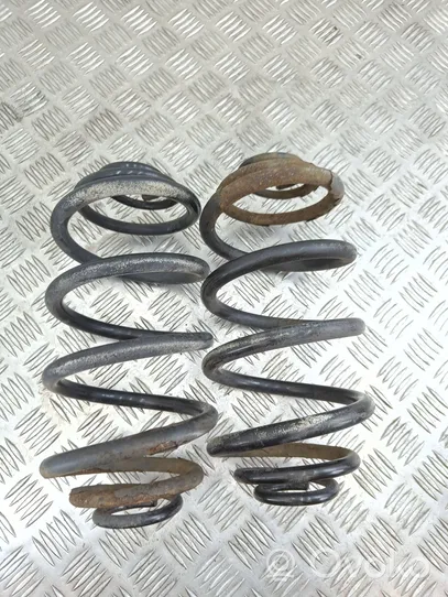 Opel Astra J Rear coil spring 