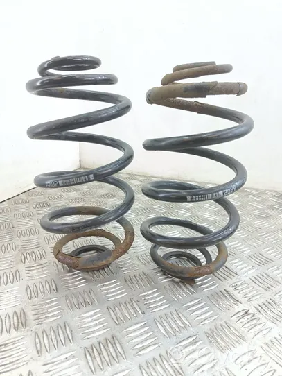 Opel Astra J Rear coil spring 