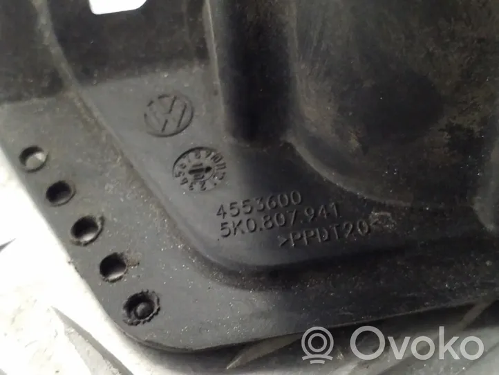 Volkswagen Golf VI Ajovalojen pesimen suuttimen pidike 5K0807941