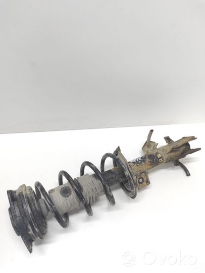 Nissan Tiida C11 Front shock absorber with coil spring 