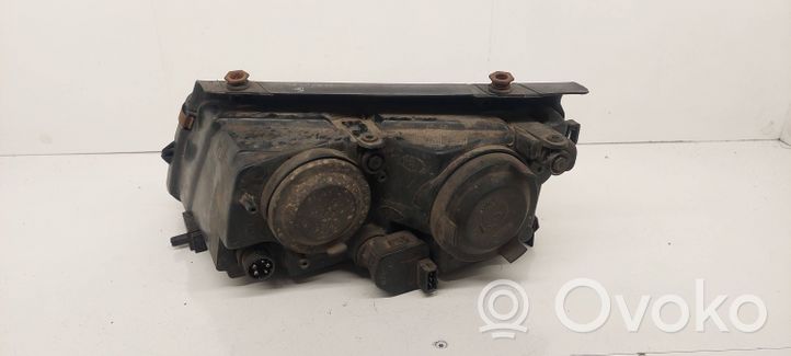 Volkswagen PASSAT B5 Lampa przednia 064411125R