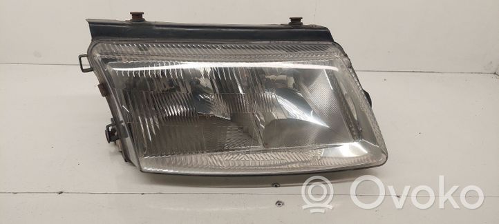 Volkswagen PASSAT B5 Lampa przednia 064411125R