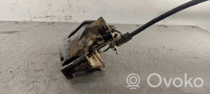 Volkswagen PASSAT B5 Caliper de freno delantero 