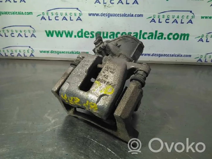 Volkswagen Tiguan Supporto della pinza del freno posteriore 5N0615404