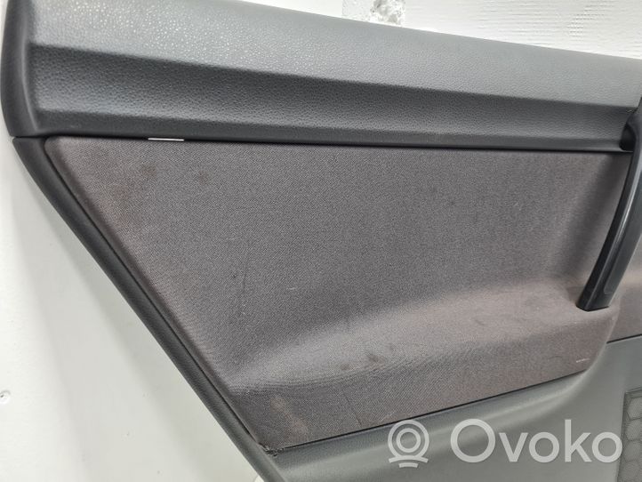 Volkswagen Polo IV 9N3 Rivestimento del pannello della portiera posteriore 6Q4867211