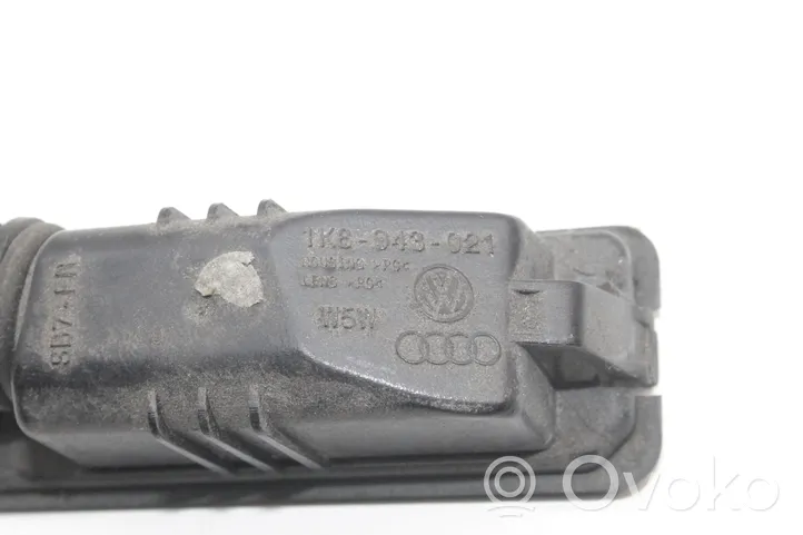 Volkswagen Scirocco Lampa oświetlenia tylnej tablicy rejestracyjnej 1K8943021