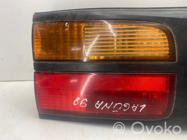 Renault Laguna I Listwa oświetlenie tylnej tablicy rejestracyjnej 7711170346